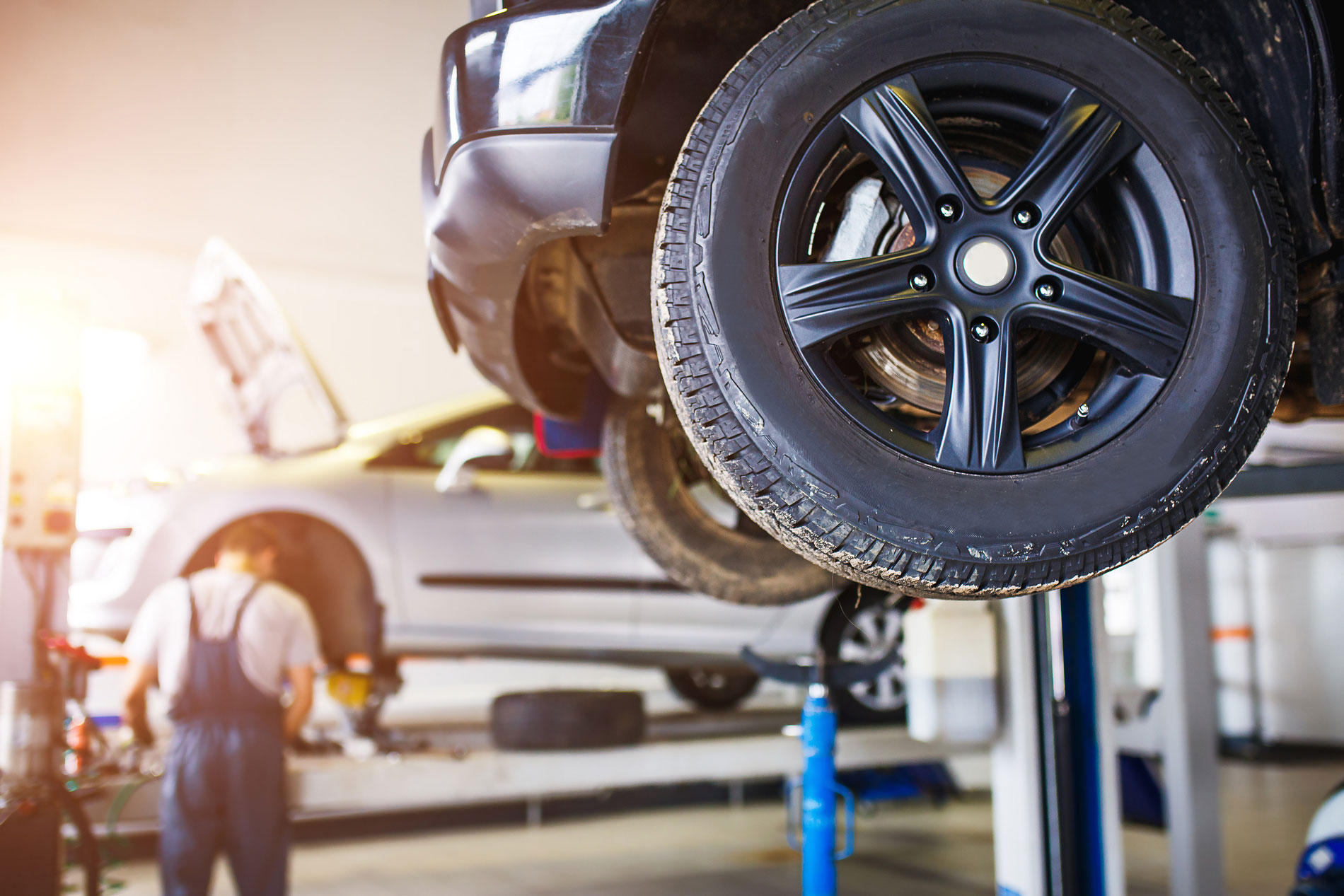 bigstock-The-Car-Is-Lifted-For-Repair-O-401309387